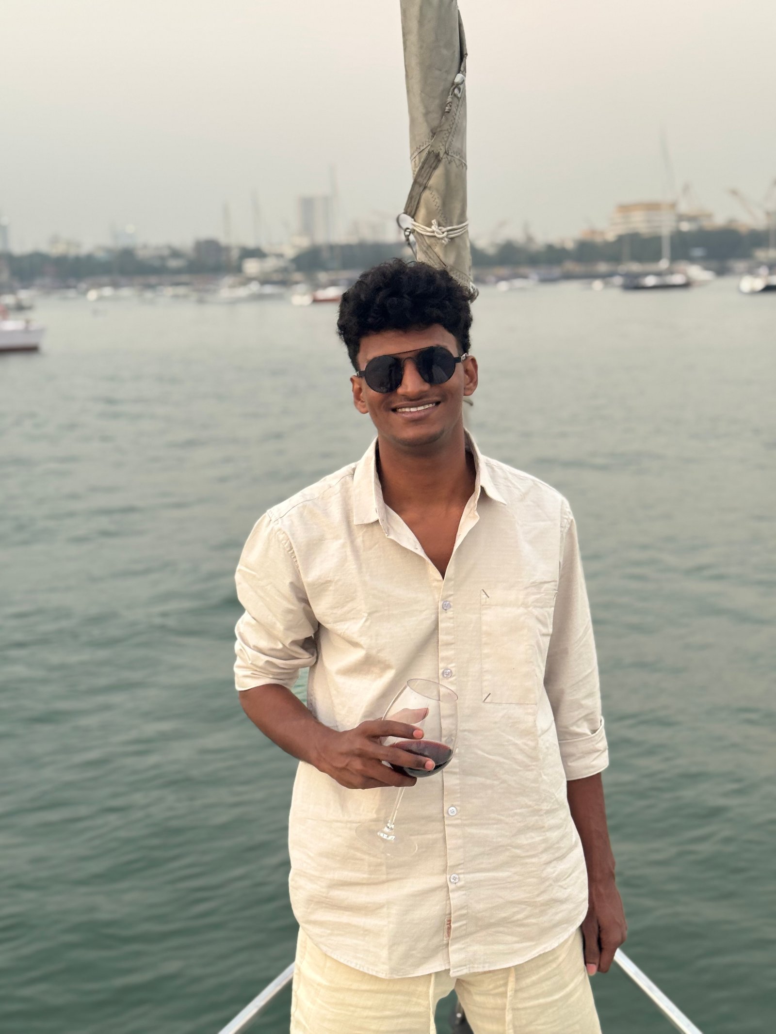 Omi standing by the water